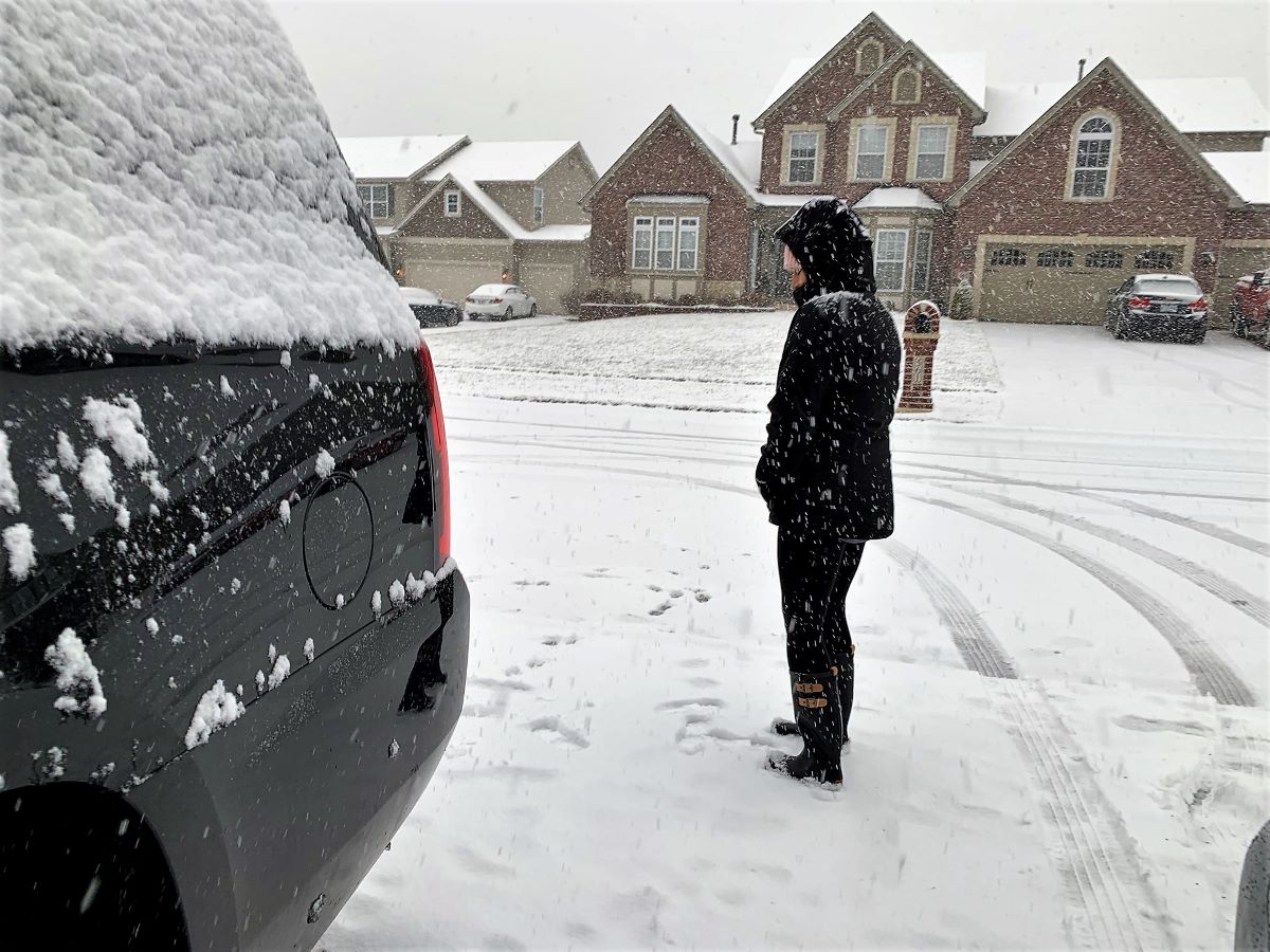 Heather and the dogs outside on this snow day