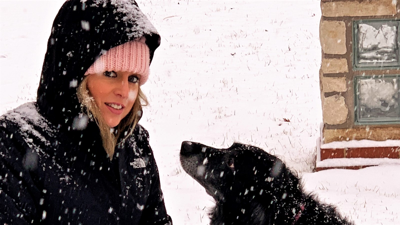 Heather Killebrew with her dog Princess enjoying a snow storm.