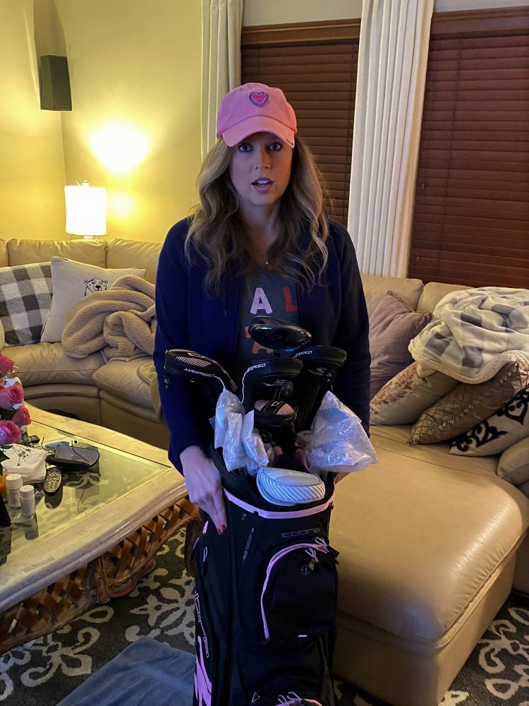 Heather Killebrew with the Golf clubs I got for her 46th Birthday. Lady Cobras. We took lots of photos.