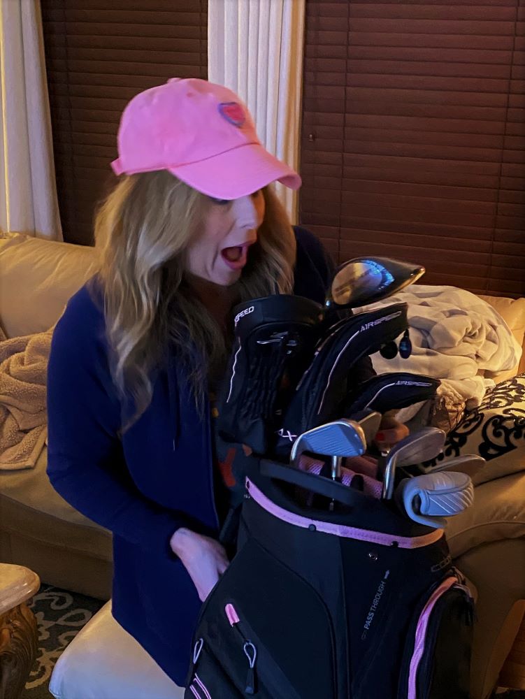 Heather Killebrew with the Golf clubs I got for her 46th Birthday. Lady Cobras. We took lots of photos.