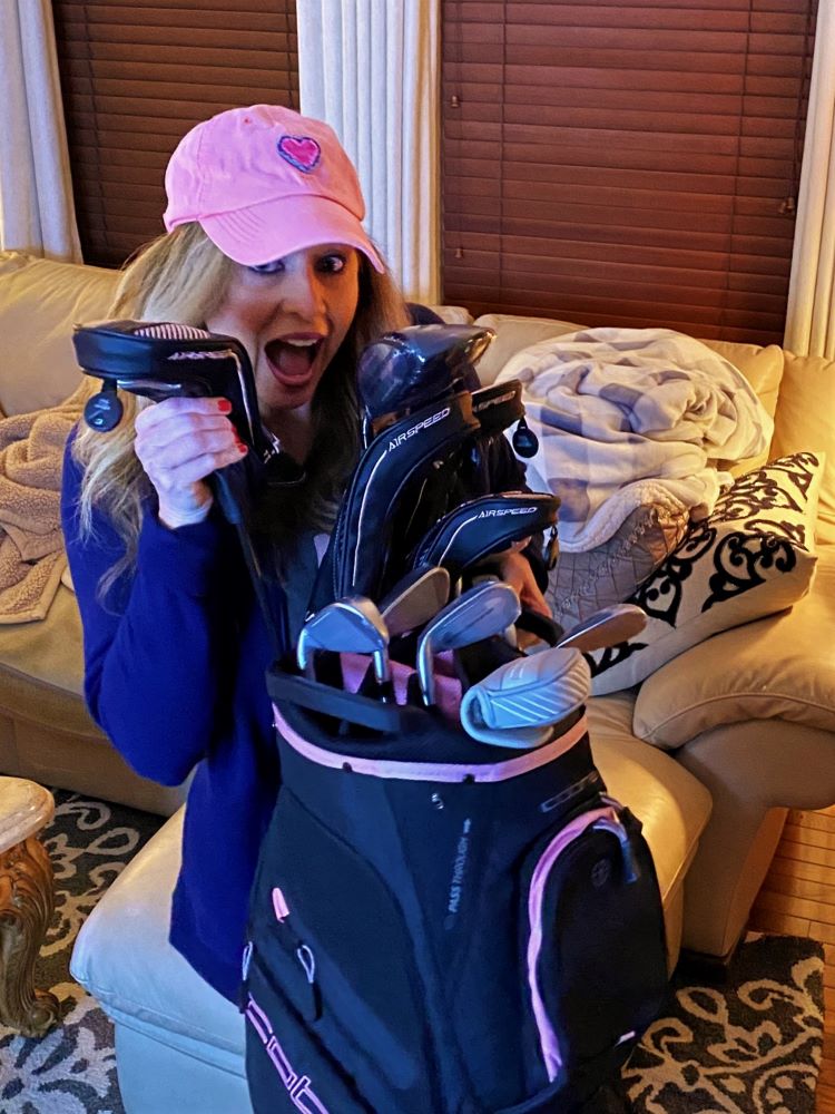 Heather Killebrew with the Golf clubs I got for her 46th Birthday. Lady Cobras. We took lots of photos.