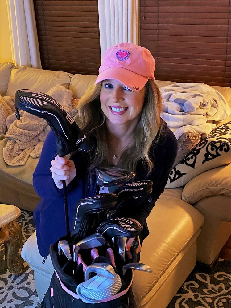 Heather Killebrew with the Golf clubs I got for her 46th Birthday. Lady Cobras. We took lots of photos.