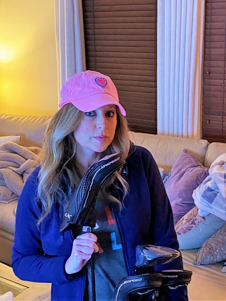 Heather Killebrew with the Golf clubs I got for her 46th Birthday. Lady Cobras. We took lots of photos.