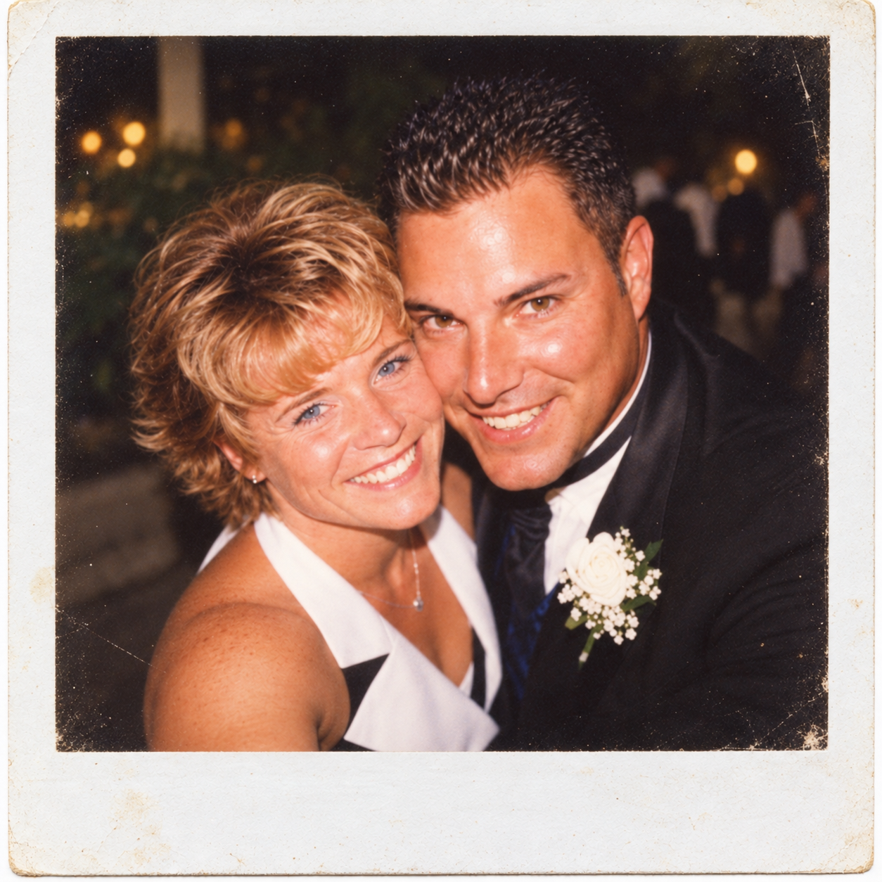 A close-up portrait of Dawne and Joey smiling together in formal attire, July 27, 2001.