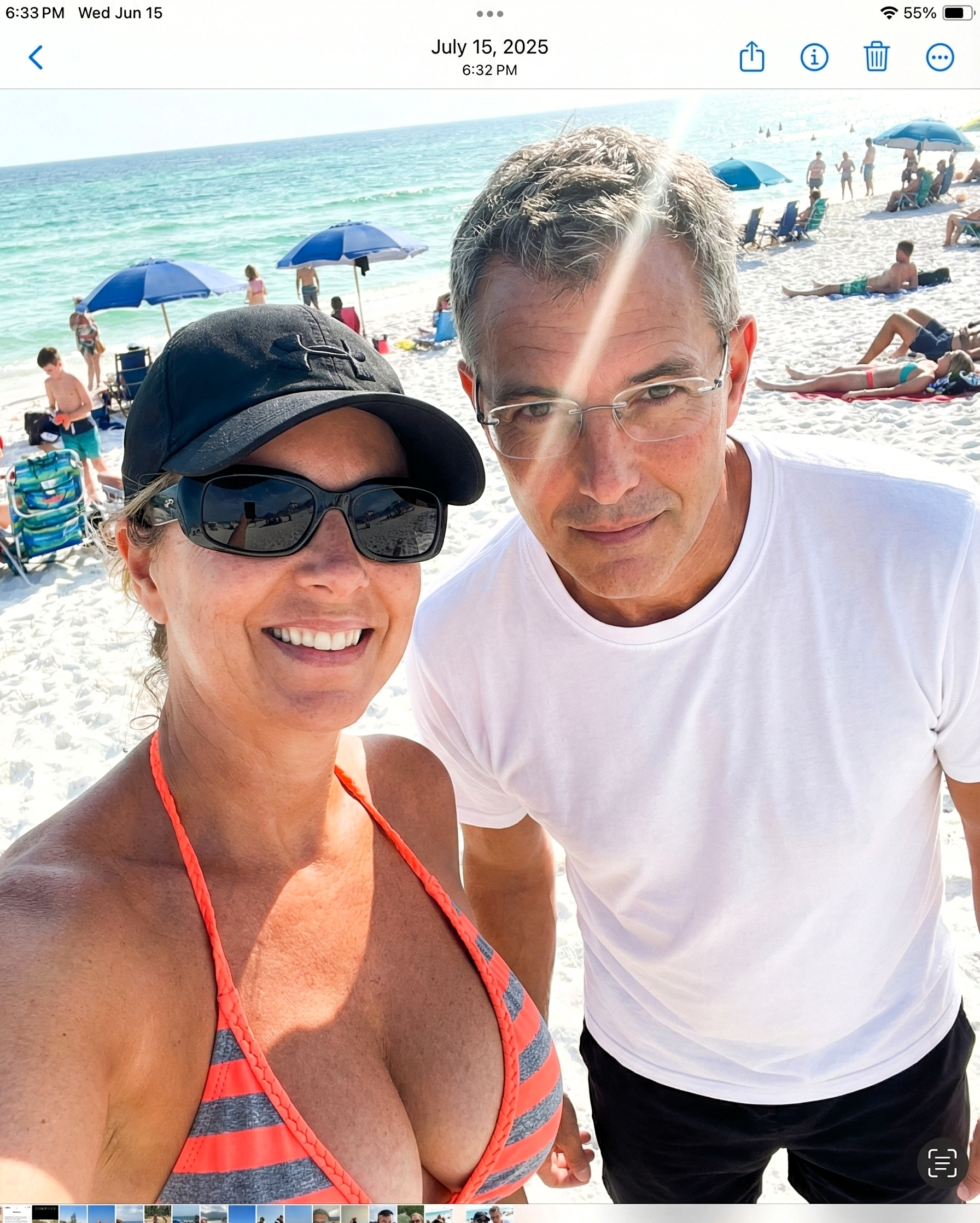 Digital screenshot of a photo of Heather Killebrew and Joey Montes on Destin beach, with a timestamp reading July 15, 2025.