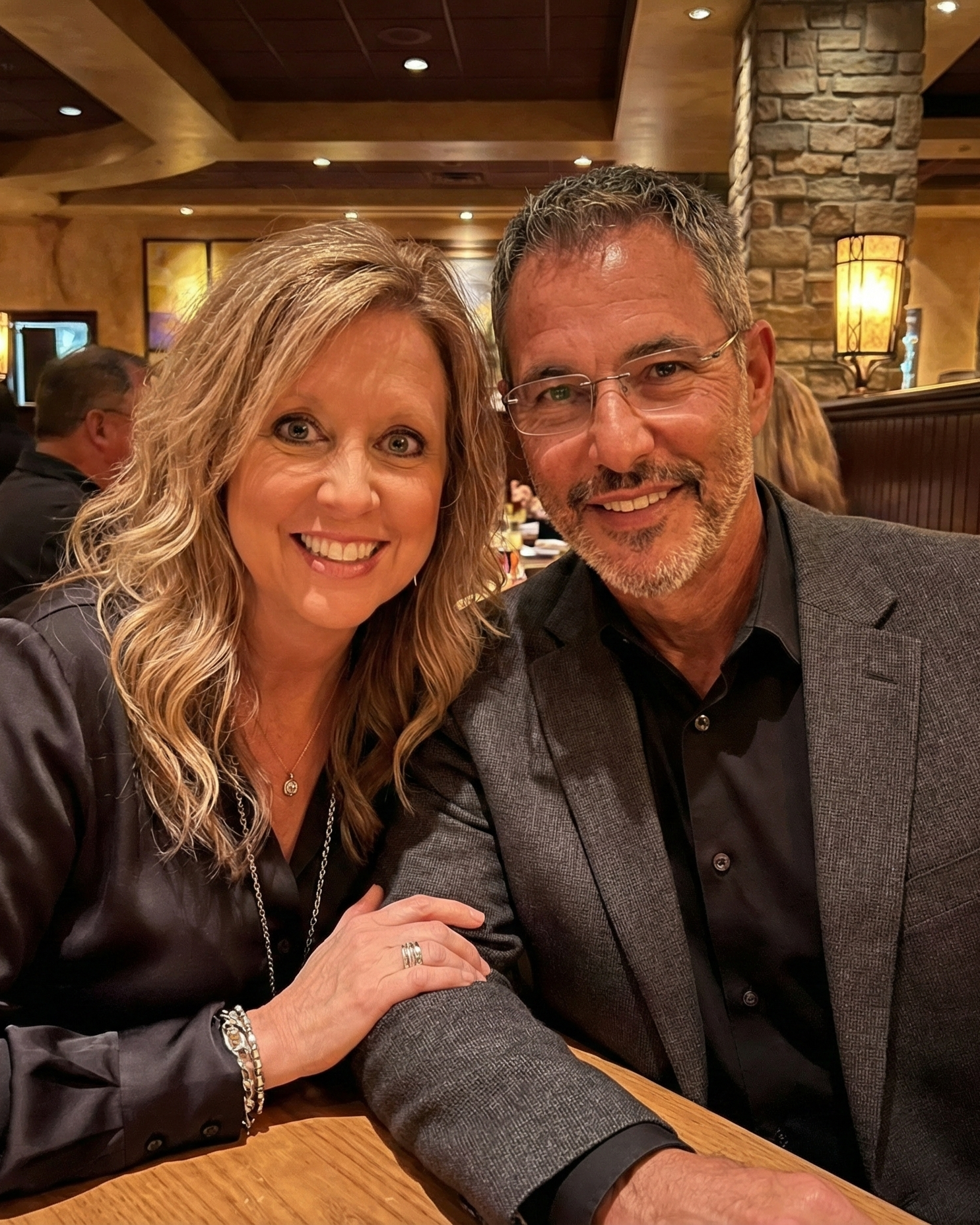 Portrait of Heather Killebrew holding Joey Montes' arm during a dinner date at The Cheesecake Factory in Chesterfield, MO.