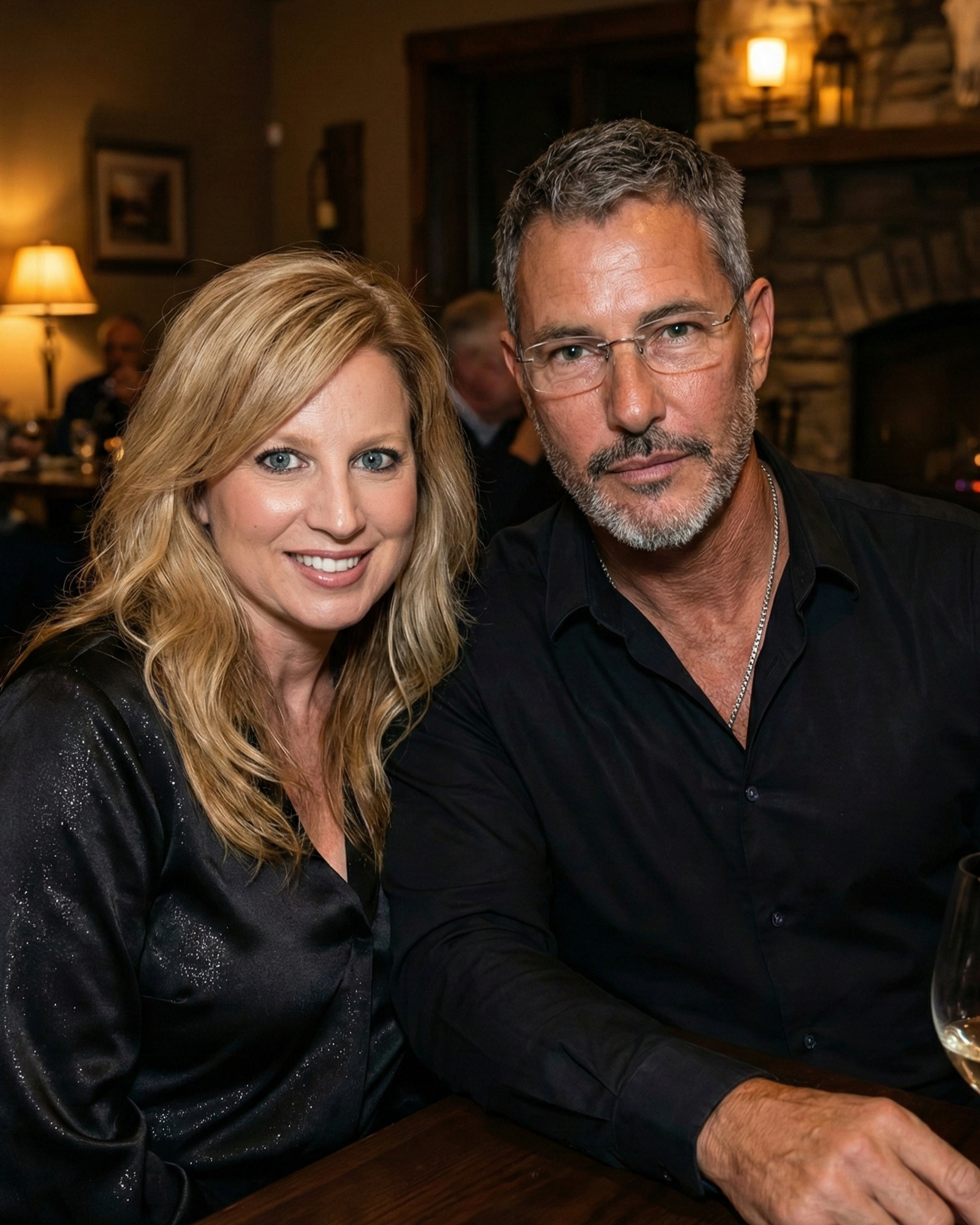 Portrait of Heather Killebrew and Joey Montes wearing matching black attire at a dinner date in Wentzville, MO.