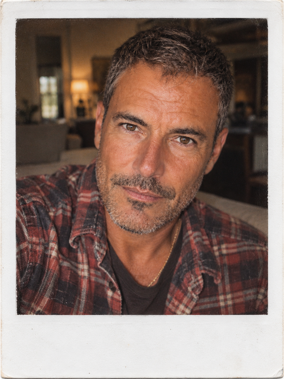 Joey looking directly into the camera in a warm-toned 2026 instant-film portrait.