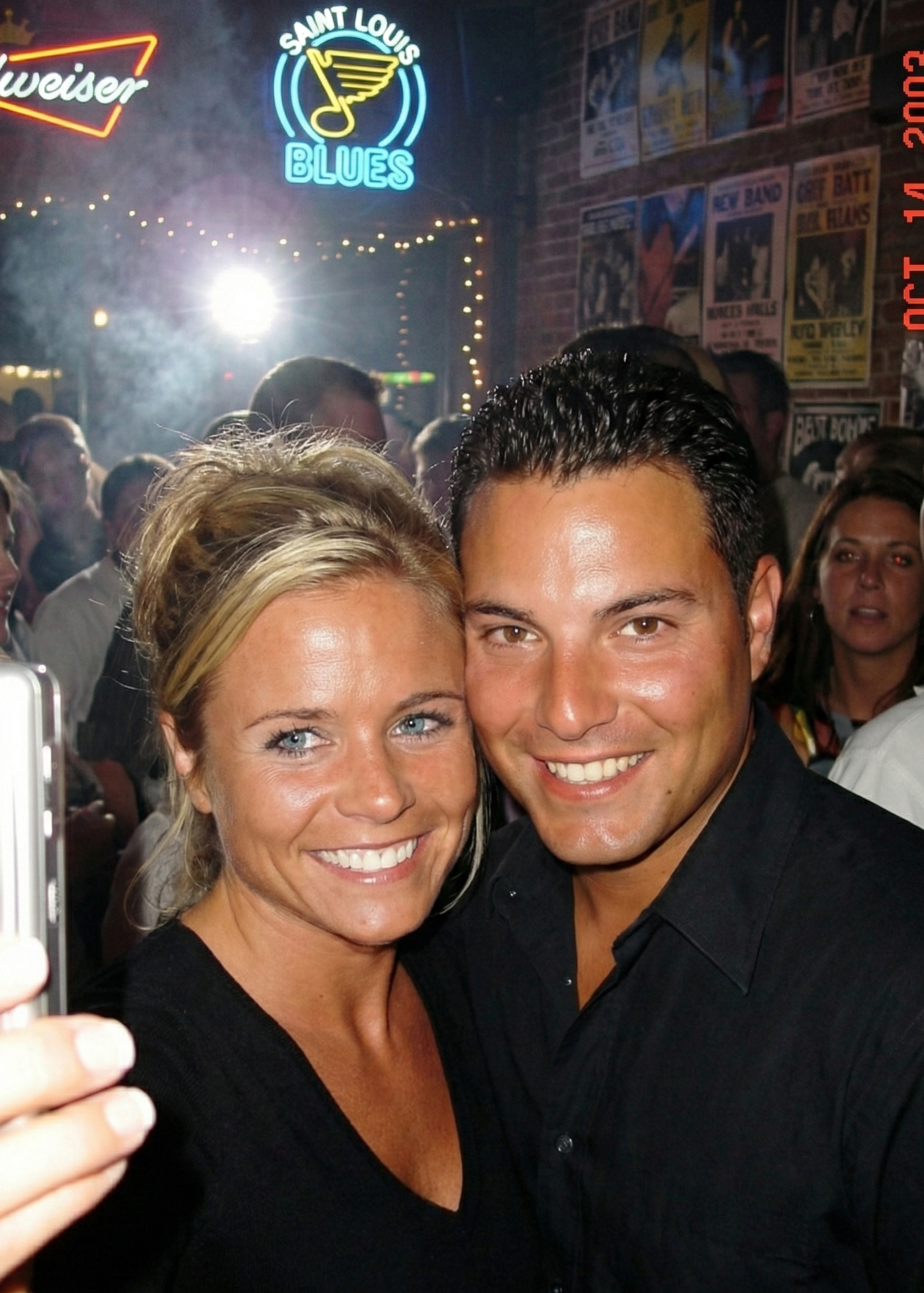 Joey and Dawne smiling brightly for a selfie in a St. Louis bar on October 14, 2003.