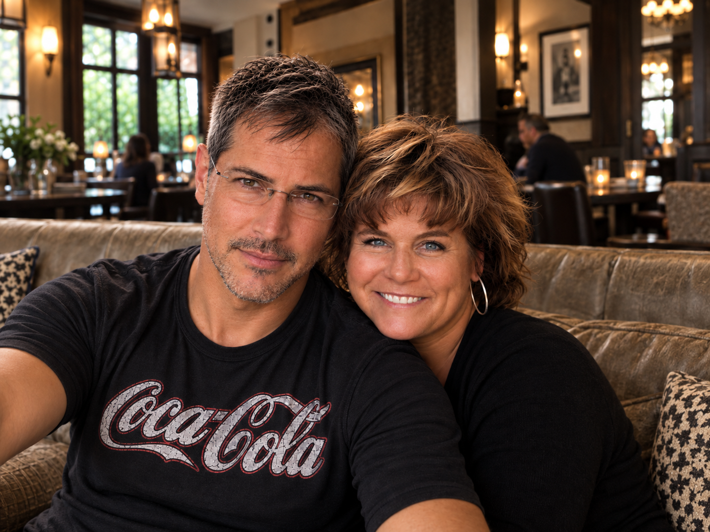 Dawne and Joey together in 2016, seated closely together and smiling for a photograph.